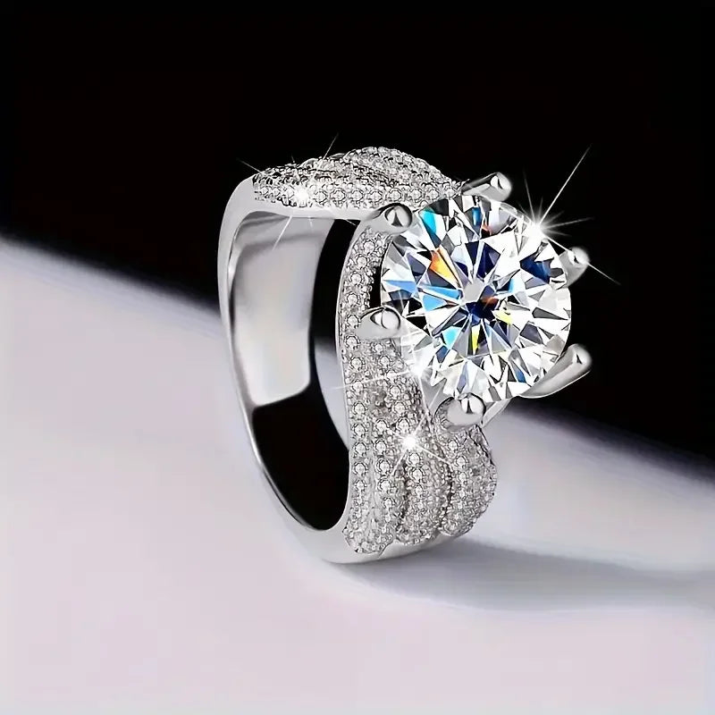 Moissanite Engagement Ring In Sterling Silver Round Brilliant Claw Setting