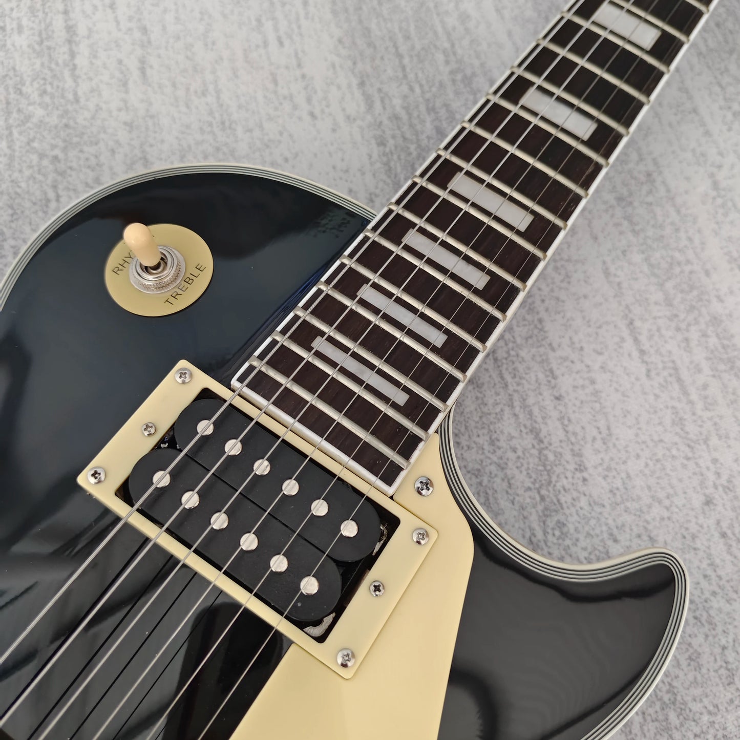 Electric Guitar With Solid Mahogany Body And Neck Construction